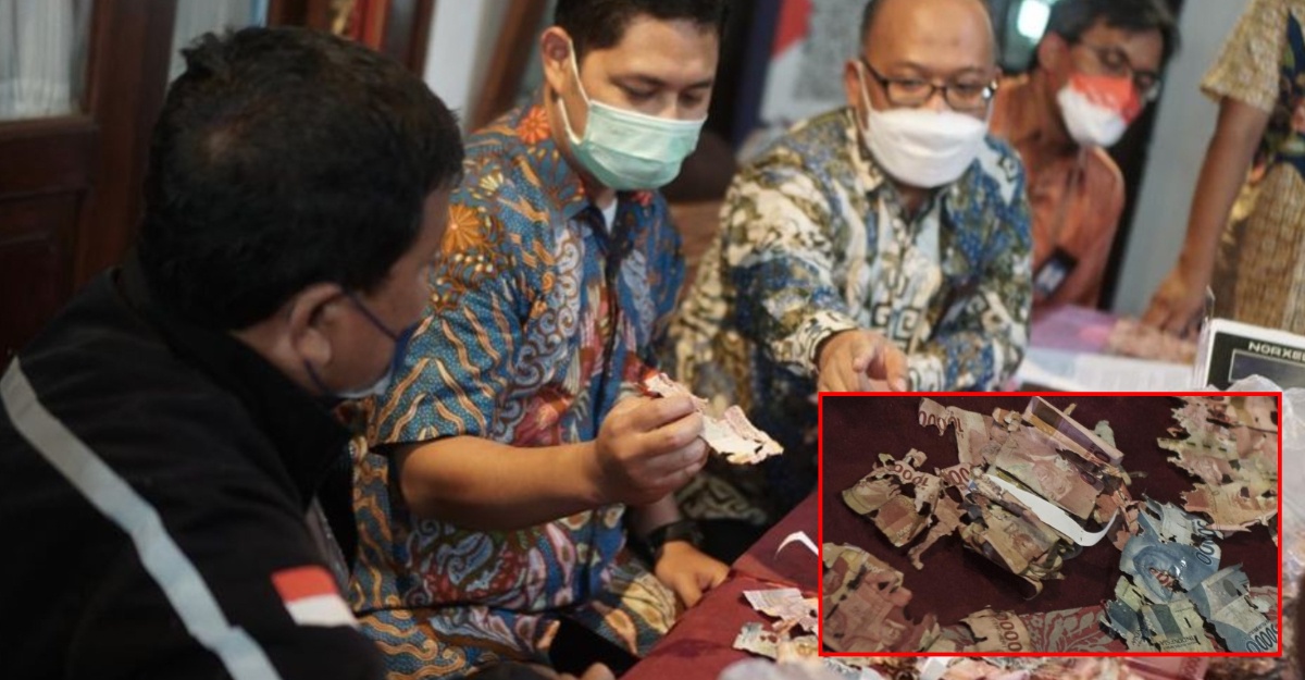 lelaki sengaja gunting wang kertas
