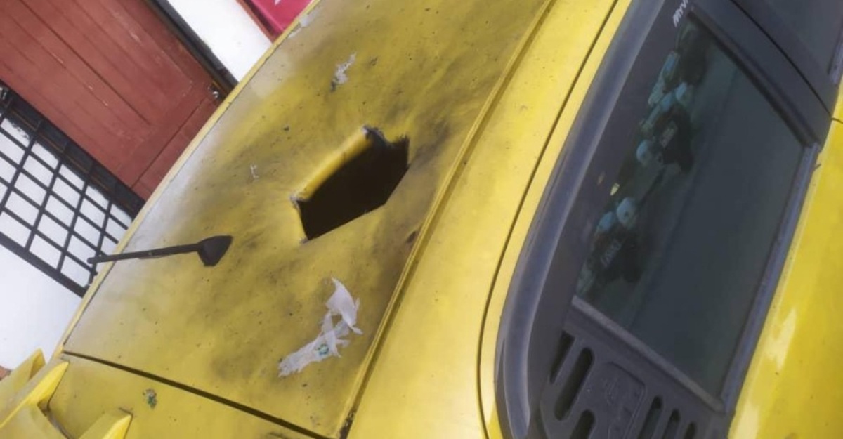 Bumbung Myvi berlubang