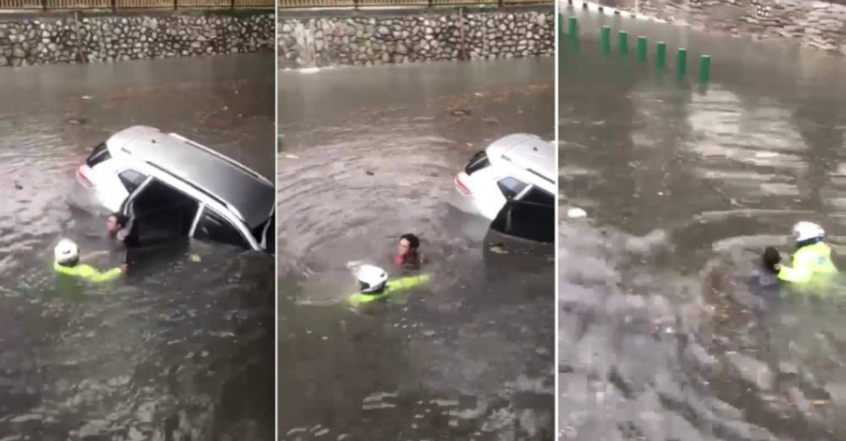Polis Trafik Pertaruh Nyawa Sendiri Demi Selamatkan Mangsa Banjir