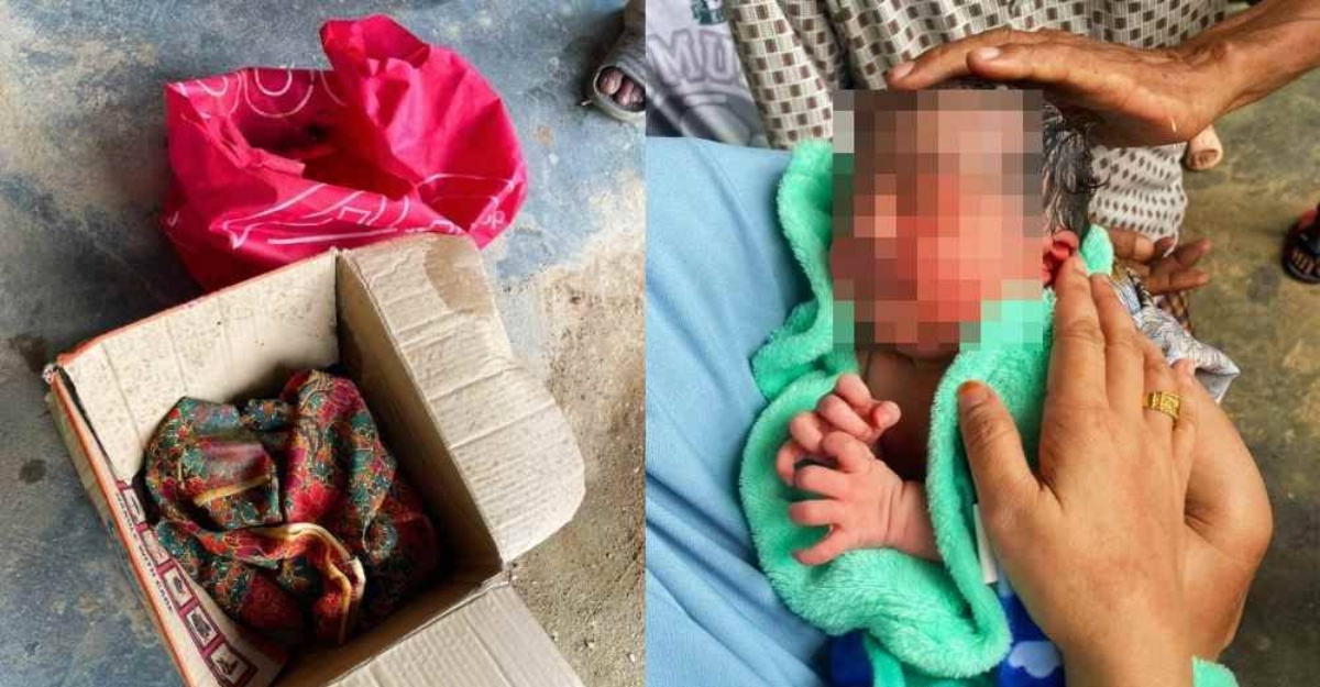 bayi berbalut kain batik tepi jalan